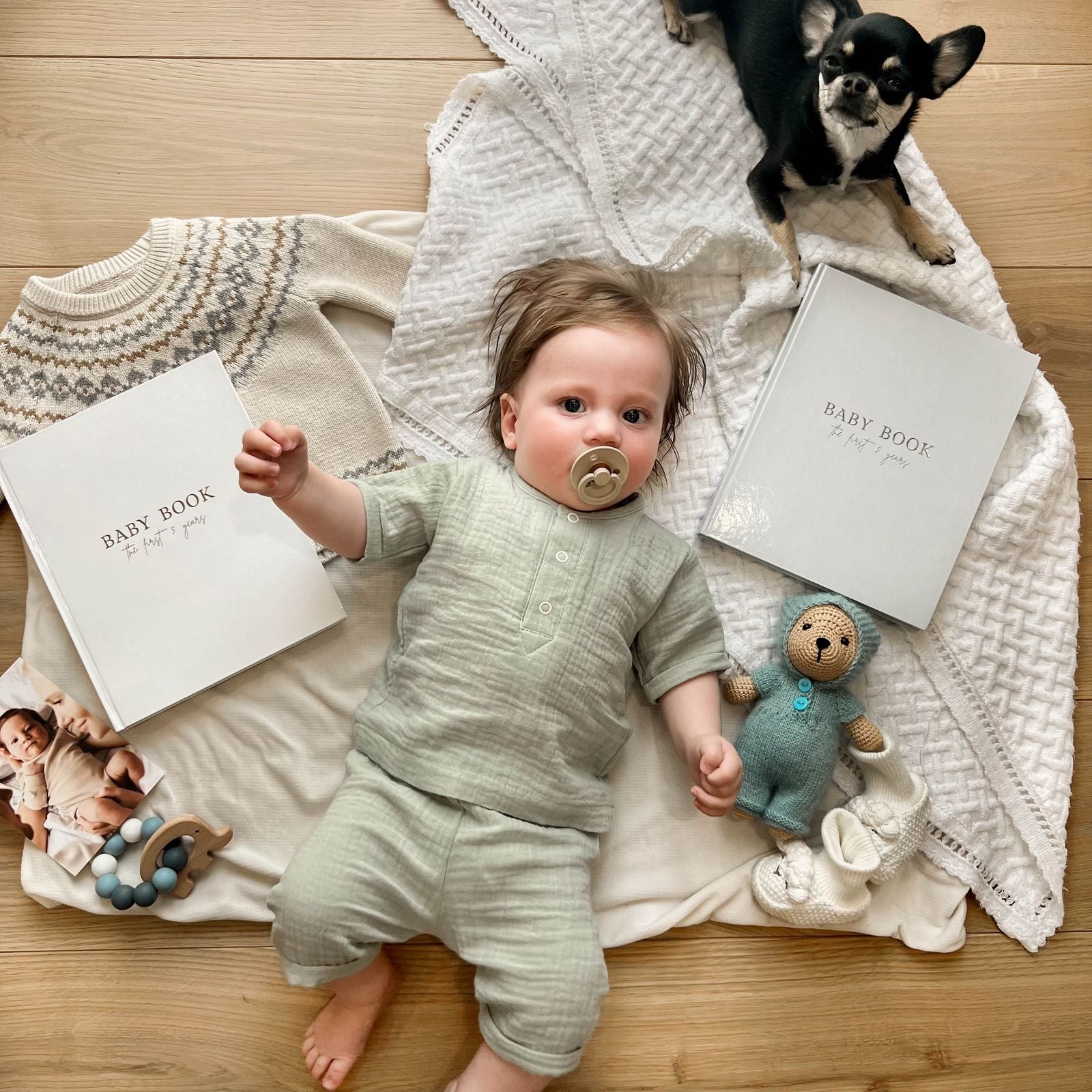 Baby keepsakes collection - memory books, stickers, and play gyms