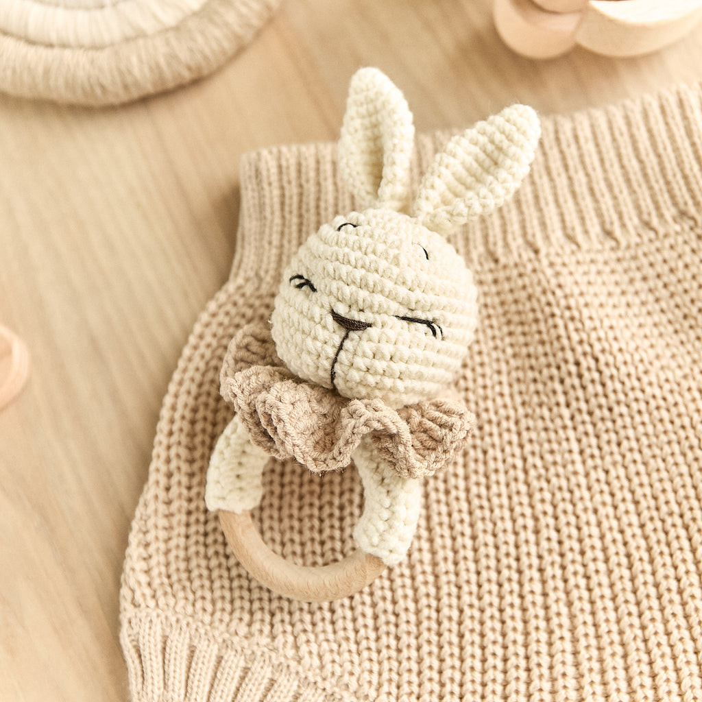 Handmade crochet bunny baby rattle with ruffled collar and wooden teething ring