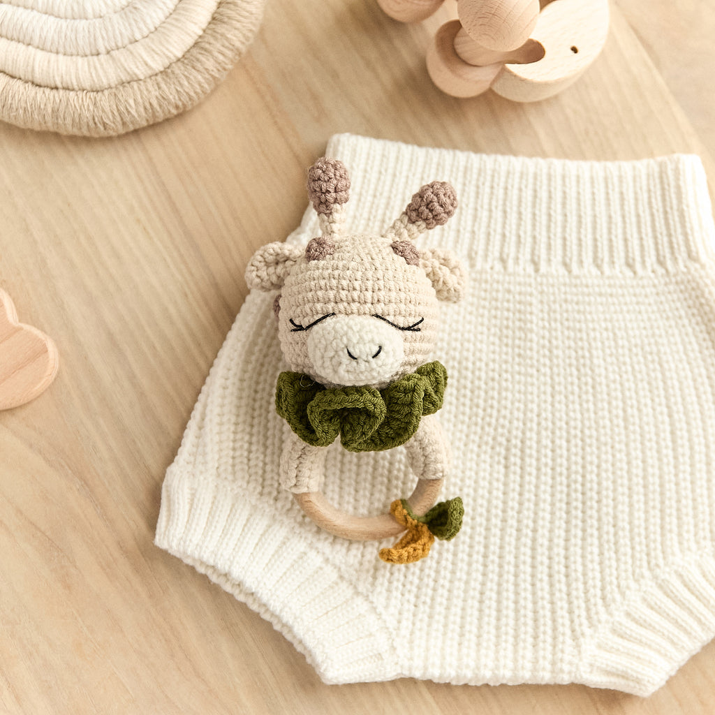 Handmade crochet giraffe baby rattle with leaf collar and wooden teething ring