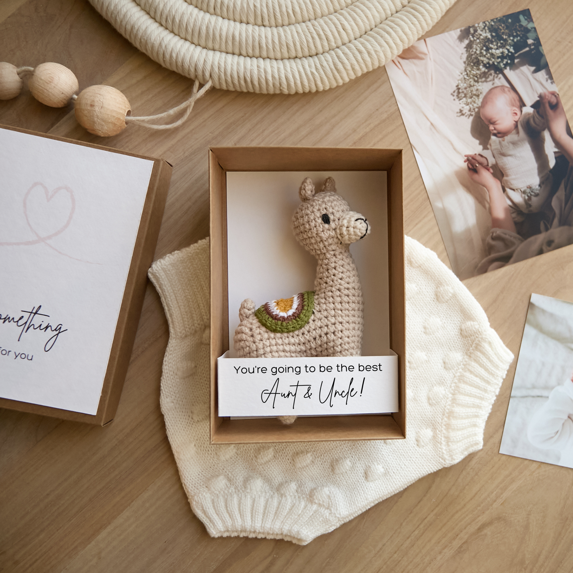 Baby announcement box featuring handmade crochet llama toy — expecting gift