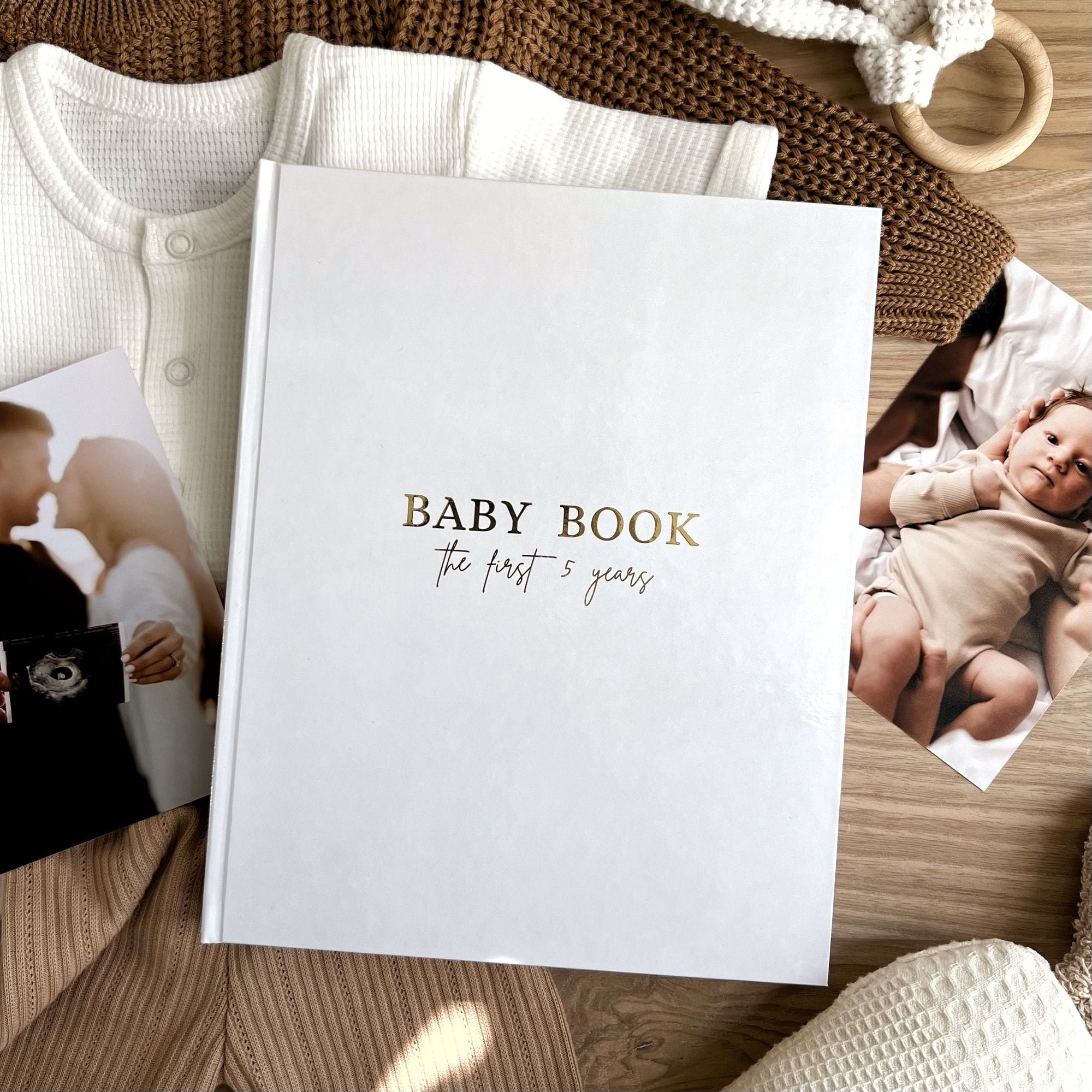 Baby memory book cover variant in classic white linen with gold foil title