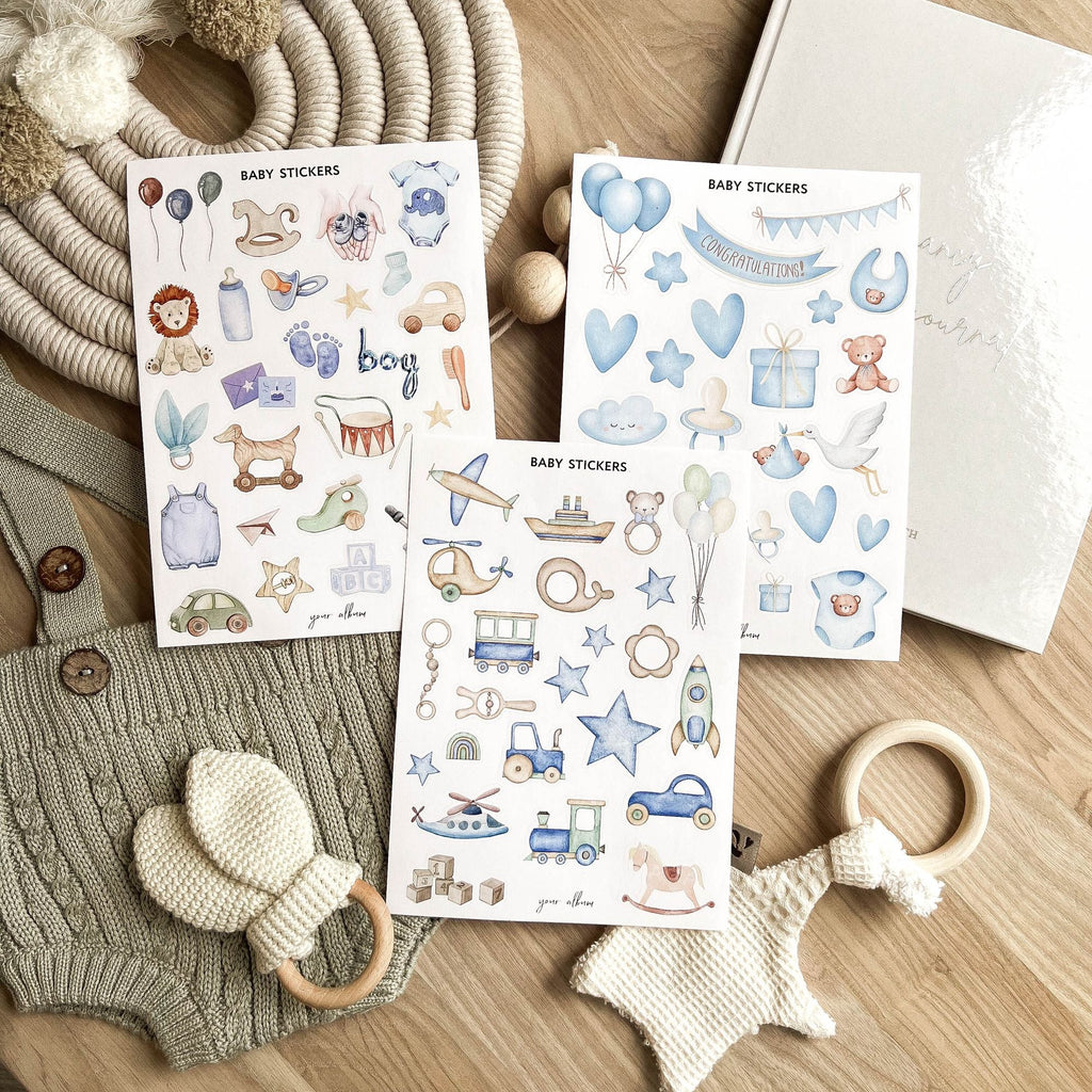 Baby milestone stickers close-up with first year event labels and icons