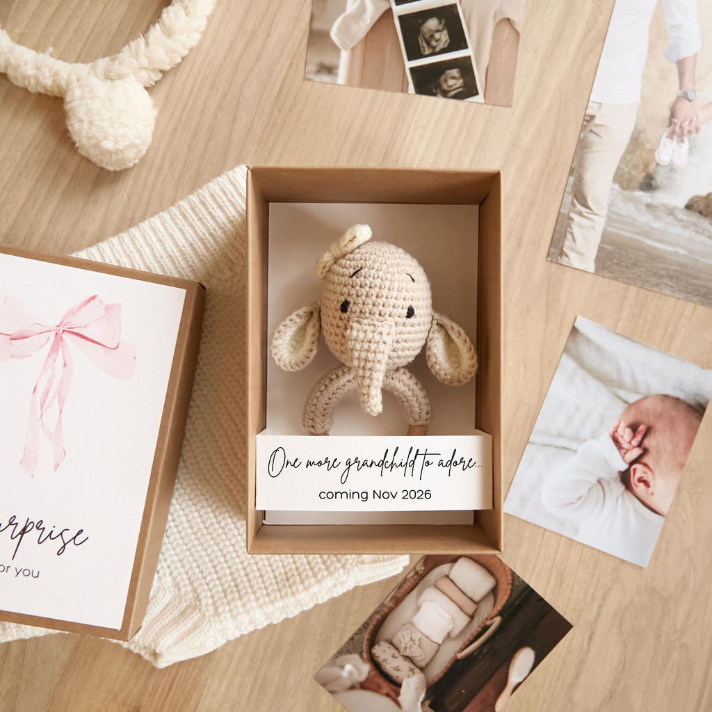 Baby reveal box featuring crochet elephant toy — we are expecting announcement