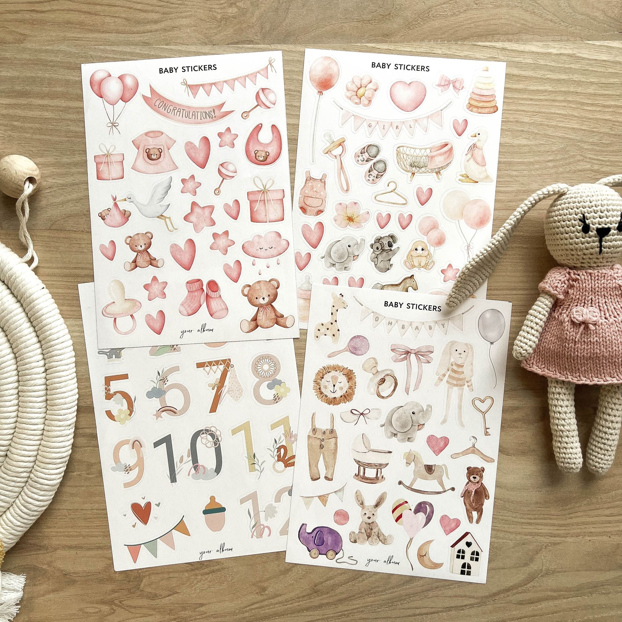 Baby sticker collection featuring alphabet letters and numbered month labels