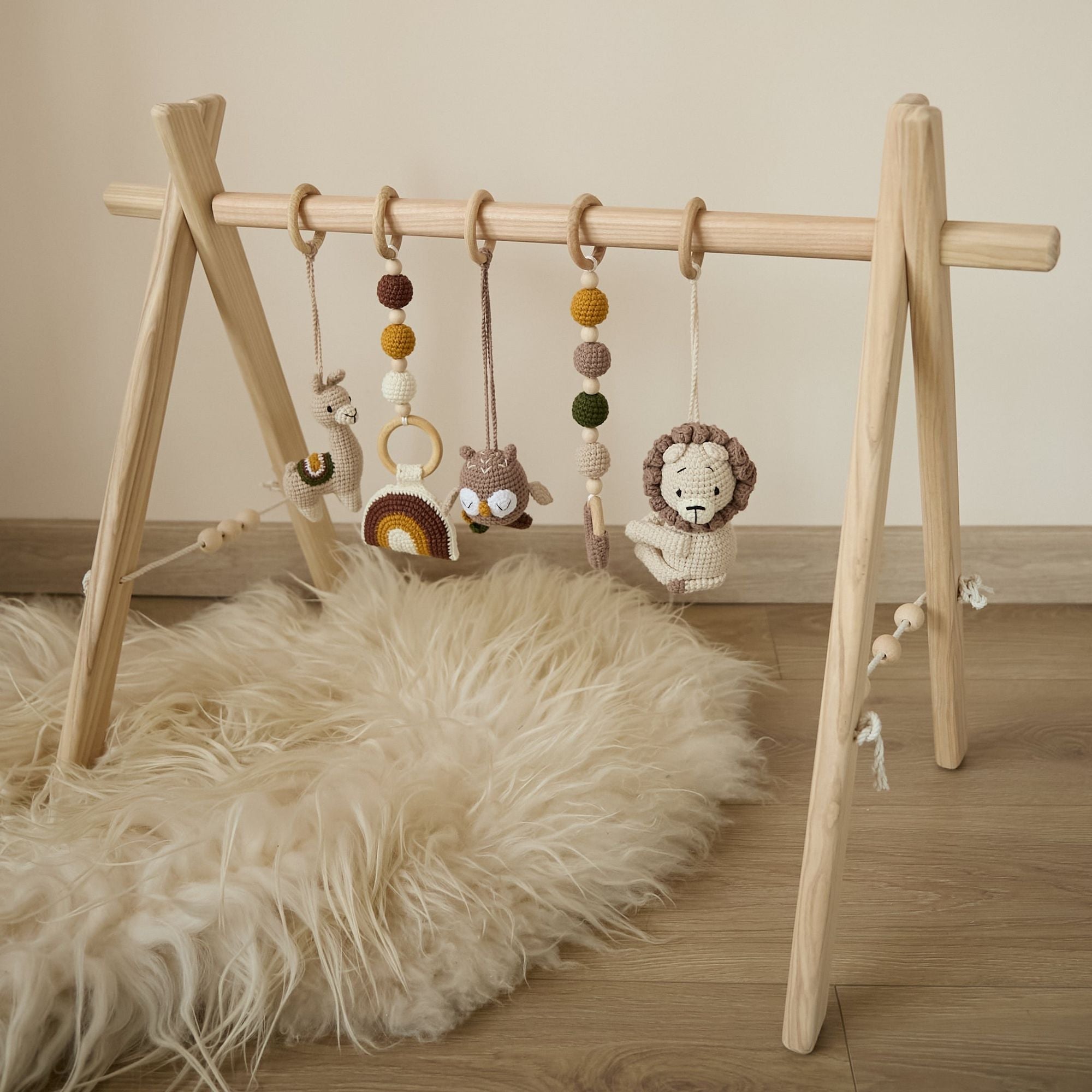 Hanging crochet toys displayed individually showing cotton yarn animal designs