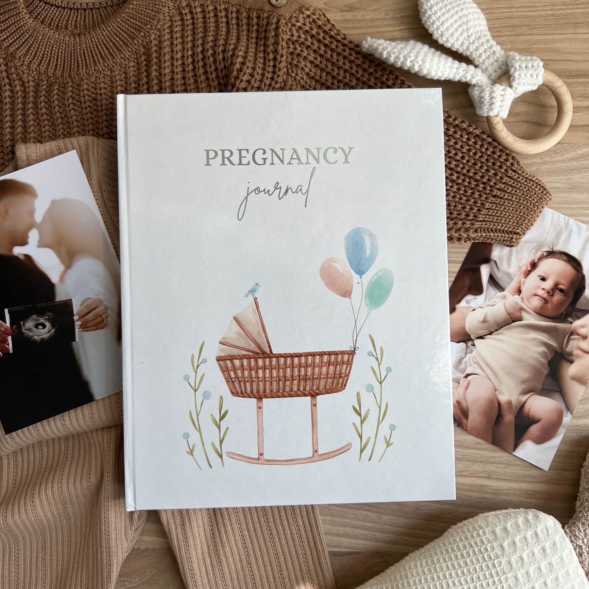 Pregnancy journal blue cover with cradle design — baby boy keepsake variant