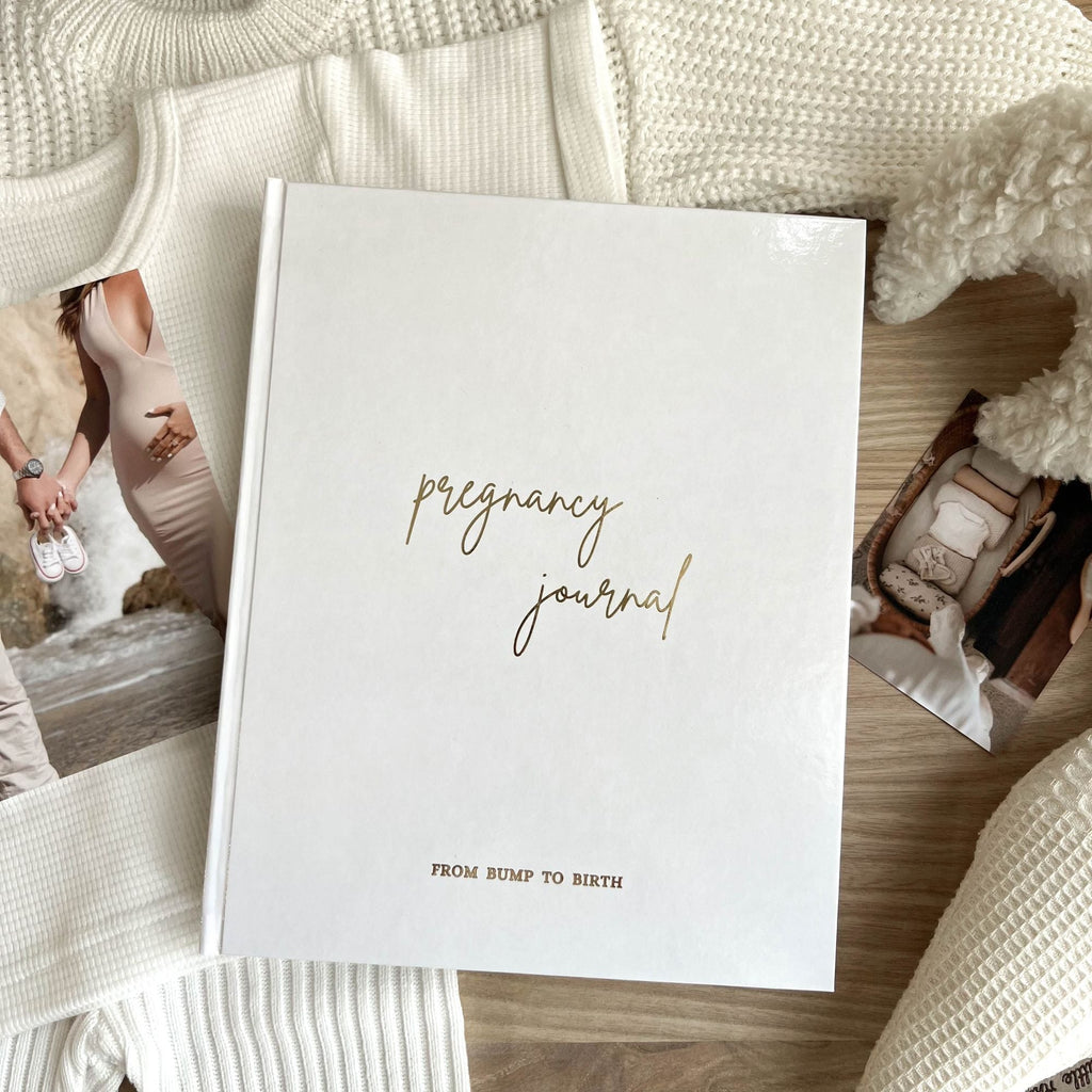 Pregnancy journal cover variant in classic white linen with gold foil title