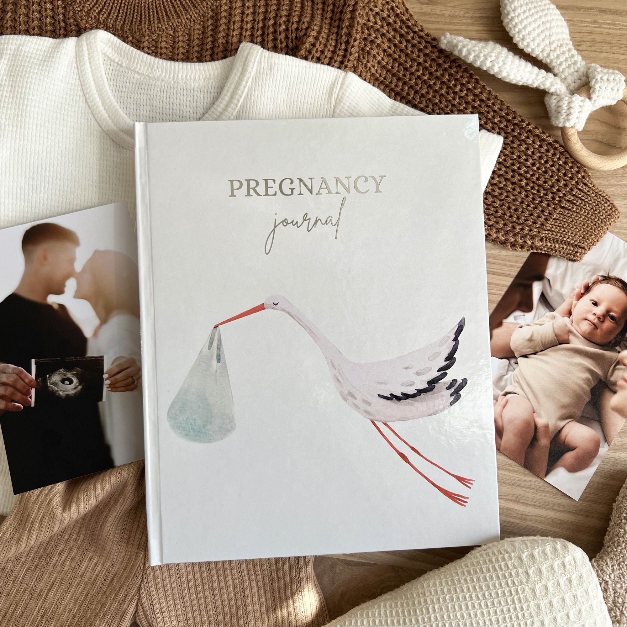Pregnancy journal cover with blue bird design — expecting baby boy edition