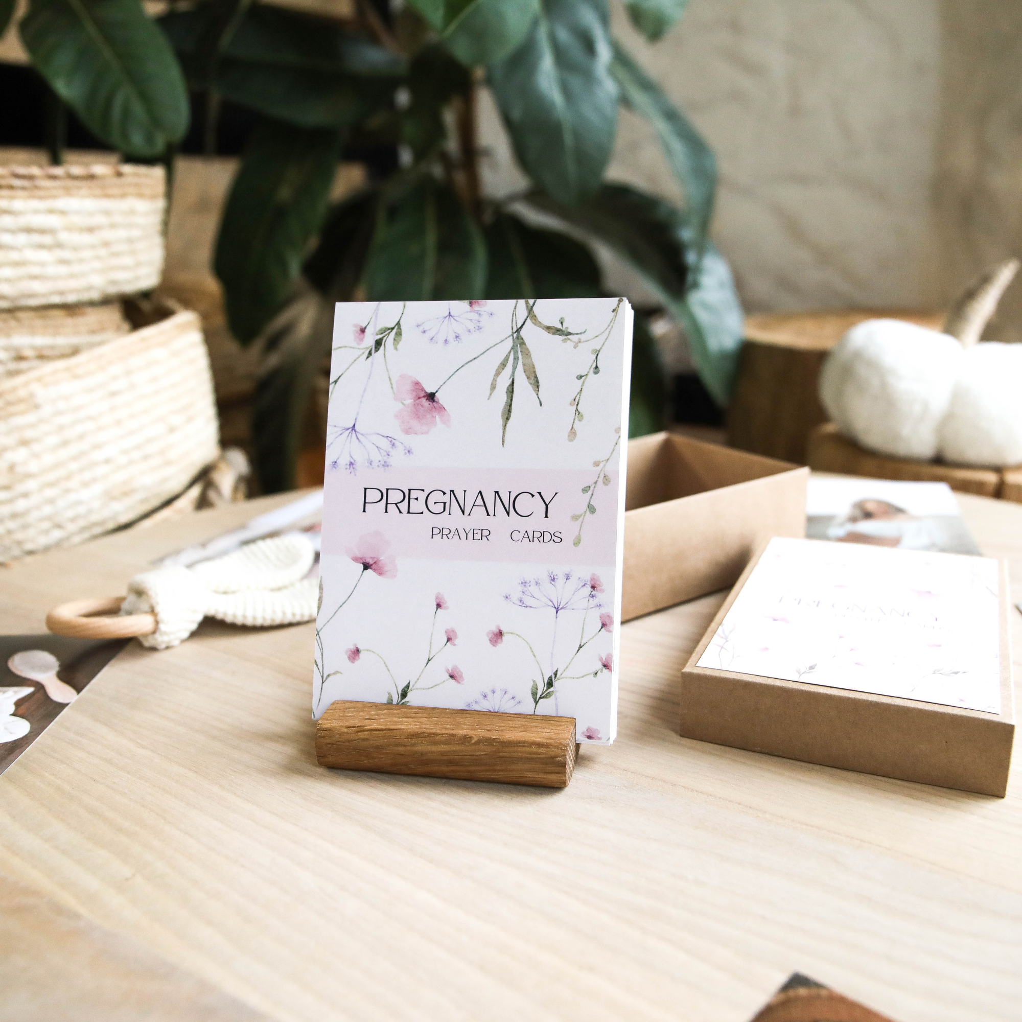 Pregnancy prayer card close-up showing scripture verse and week number design